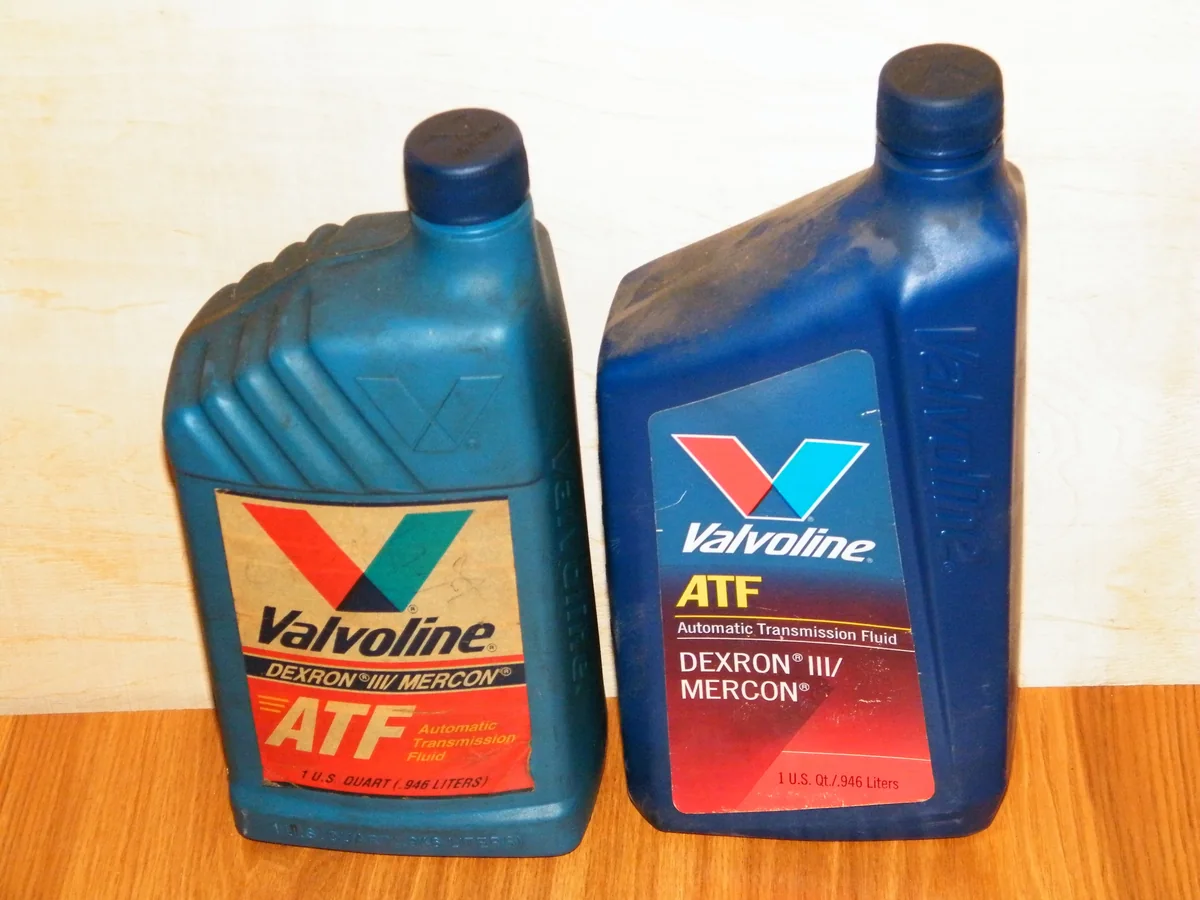 Two bottles of automatic transmission fluid labeled Dexron III.