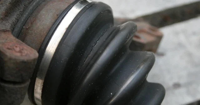 Cracked rubber boot on a car's CV axle