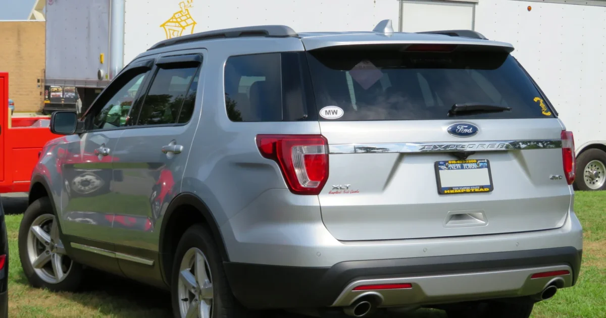 Silver 2017 Ford Explorer XLT viewed from the rear, with its roof antenna visible between the roof rails.
