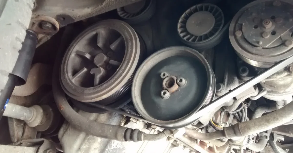 The belt and pulley area of a Volkswagen T4, including the power steering drive.