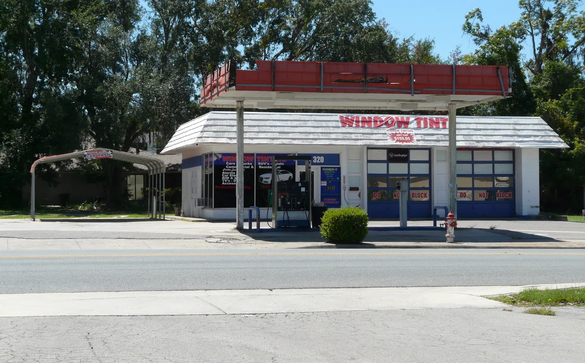 A small window tint shop in an old gas station in Live Oak, Florida